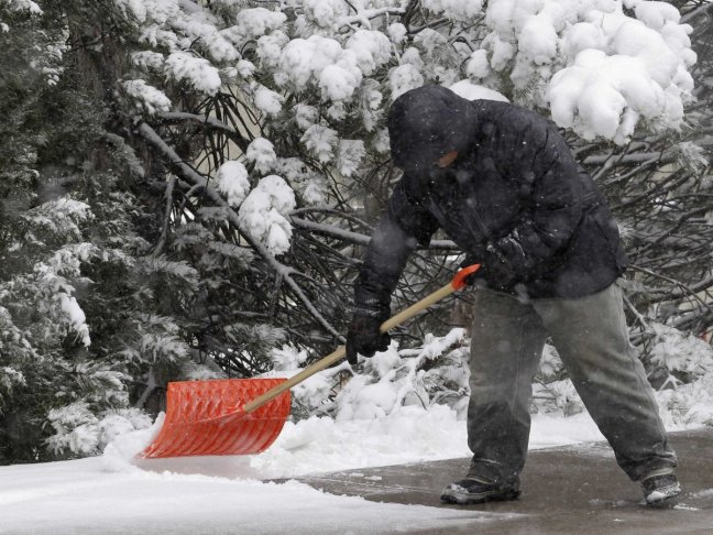 man-shoveling-snow-winter-1